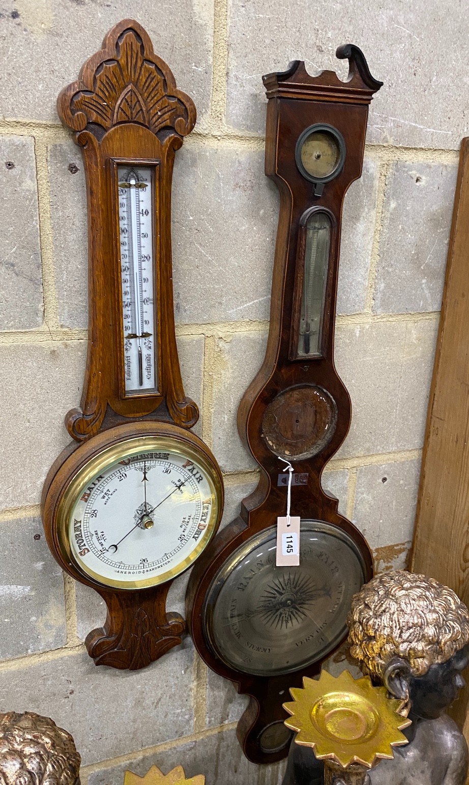 A Cicceri and Co, London wheel barometer and a late Victorian carved oak barometer, larger height 109cm